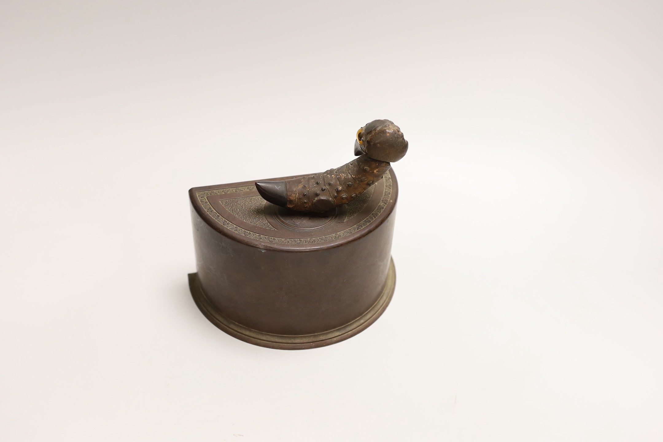 A YZ bird on bakelite cigarette dispenser by Henry Howell & Co Ltd for Alfred Dunhill & Co, 16.5cms wide x 17cms high